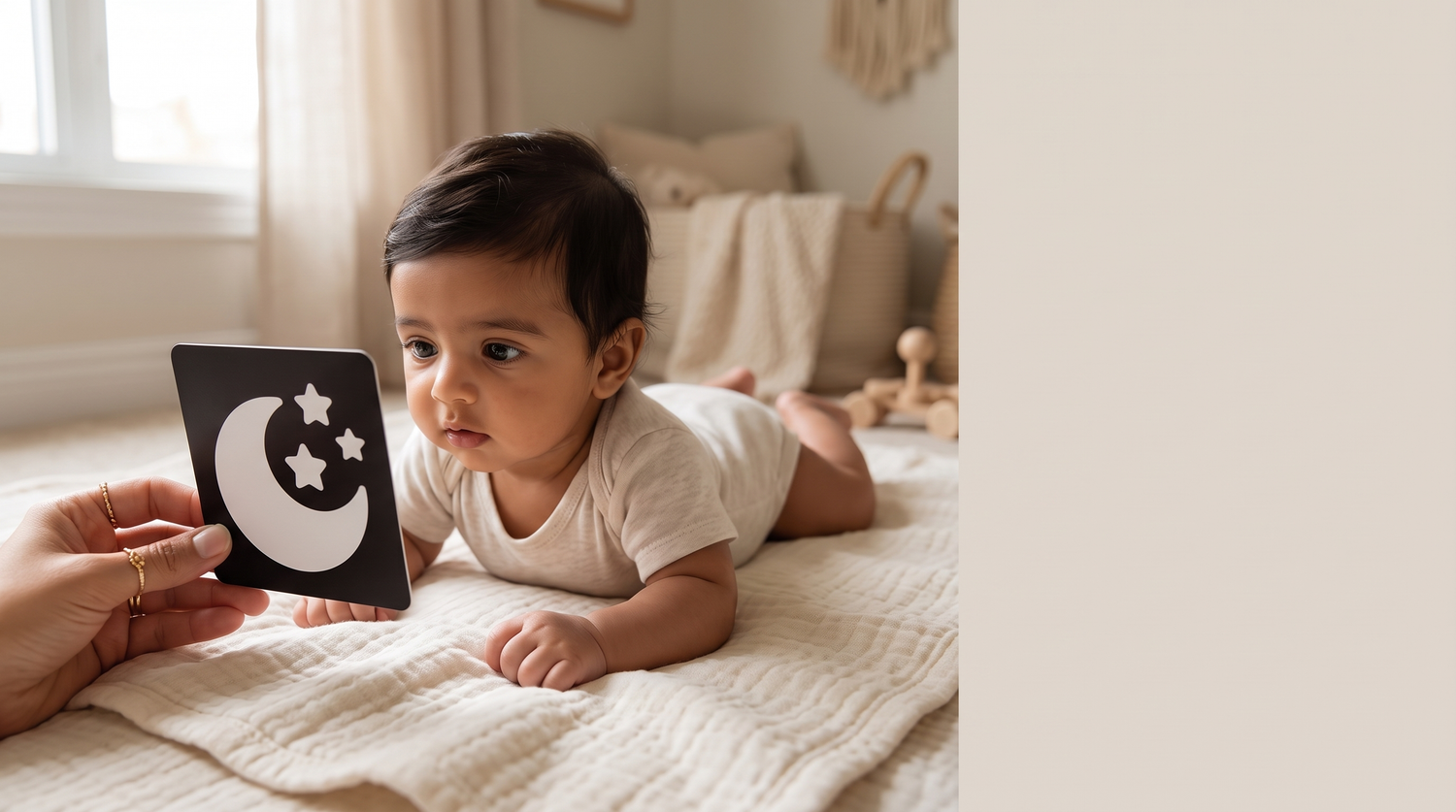 Sensory & Development collection — mother holding high-contrast card for newborn